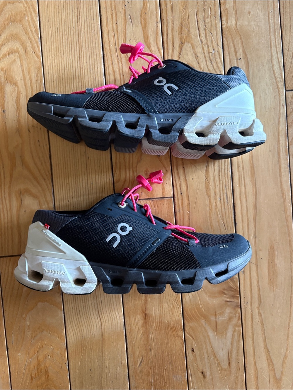 On Running Black Athletic Shoes with Pink Laces